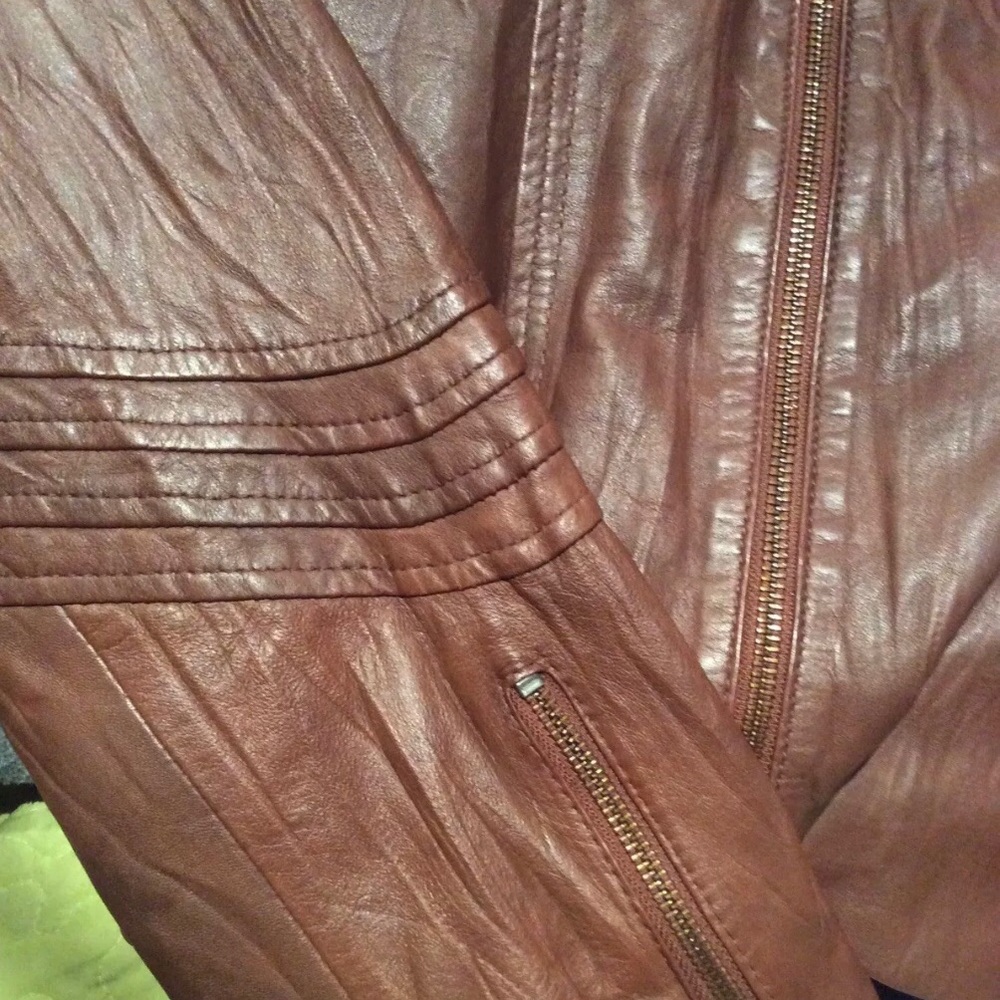 Distressed leather motorcycle jacket